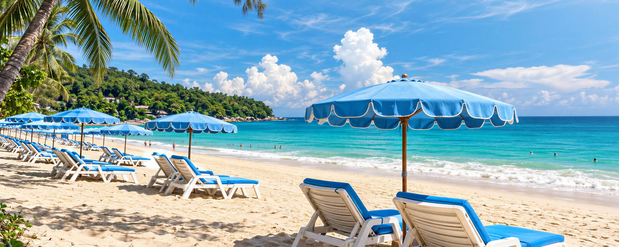 Palms and sunbeds on the beach